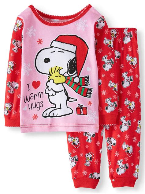 This Snoopy pajama set for men features a top and bottom. The long sleeve shirt showcases a large Joe Cool character design. The pants have a detailed allover design of the Snoopy Joe Cool character. They are made of an extra soft and comfy 100% polyester fabric.